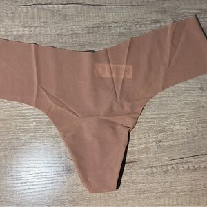 Victoria's Secret Light Brown Thong. Size L. Clean & smoke-free home. NWT.